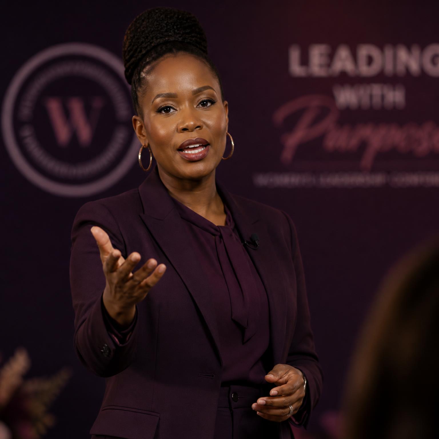 Confident professional woman speaking to an audience